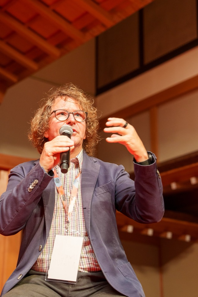 Uwe Allgäuer speaking about coliving and community-building